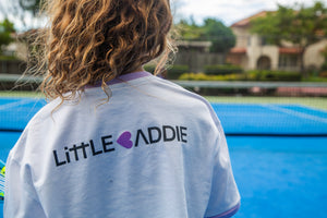 White girls cropped tee with leopard heart glitter graphic by Little Baddie, trendy tween streetwear top for ages 6 to 12, backside