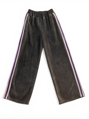 girls wide leg pants in black with sporty side purple/pink/white tape detail by Little Baddie, trendy tween streetwear outfit, product only front