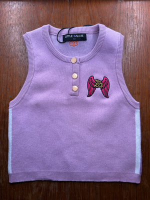 Little Baddie kidswear product photo. Model Isla is aged 9, 27kg and 133cm tall, wearing size 9/10.